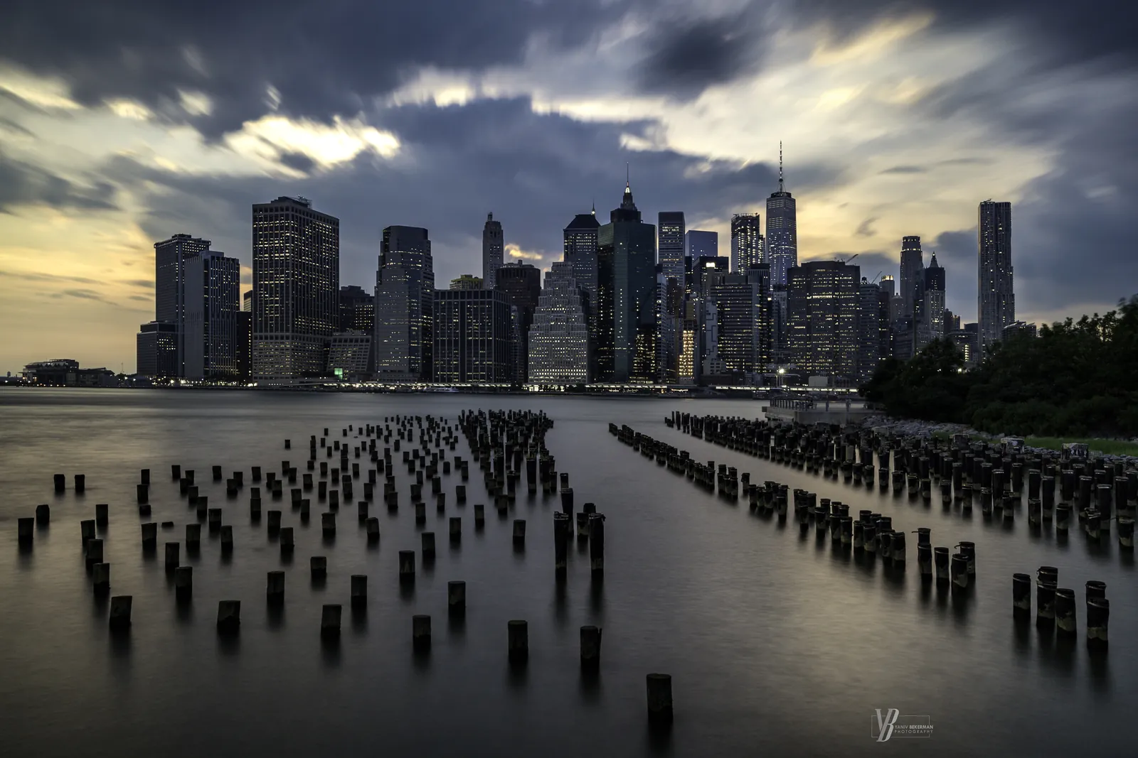 Manhattan from the Pilings, Brooklyn, New York, photograph by Yaniv Bekerman