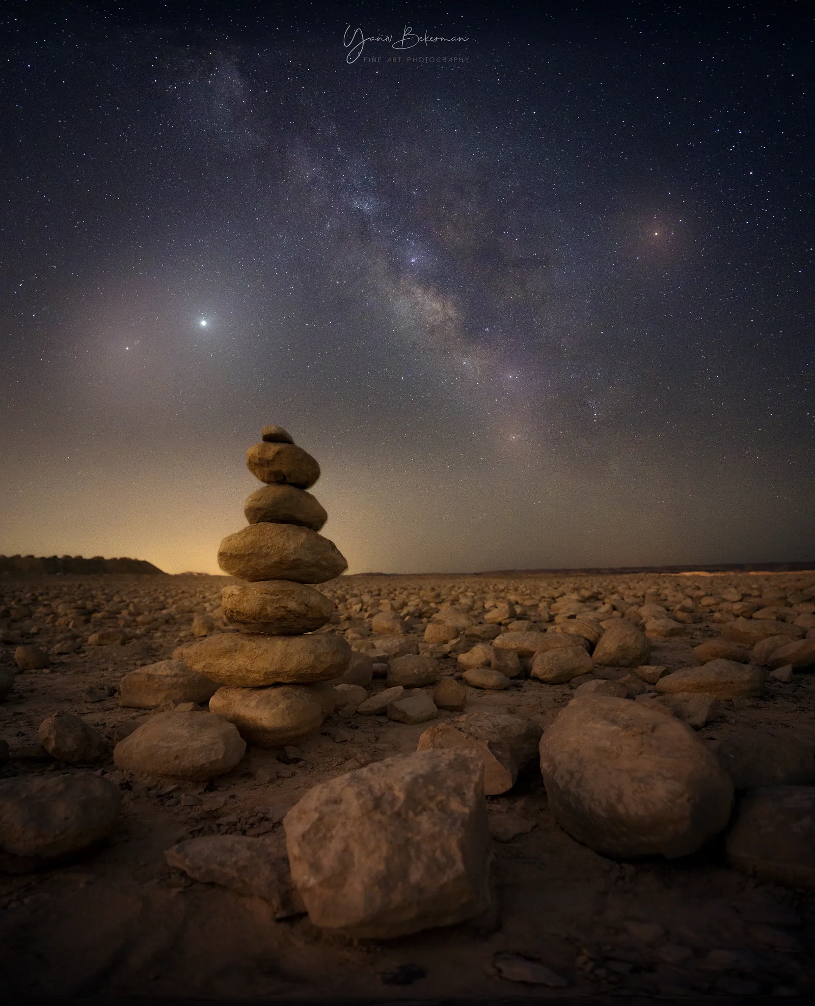 Cairn Under the Milky Way, Negev, Israel, photograph by Yaniv Bekerman