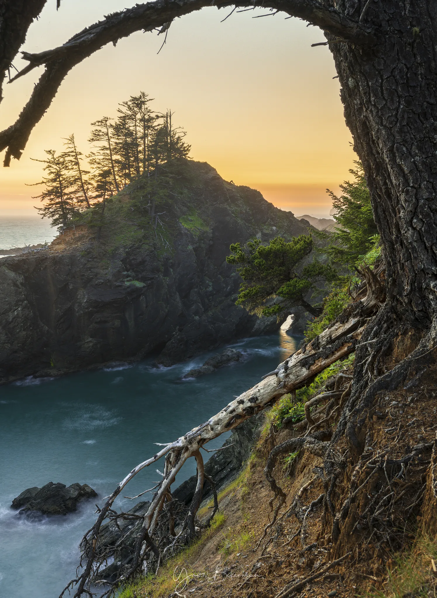 Natural Bridges at Sunset, Samuel H. Boardman Corridor, Oregon, photograph by Yaniv Bekerman