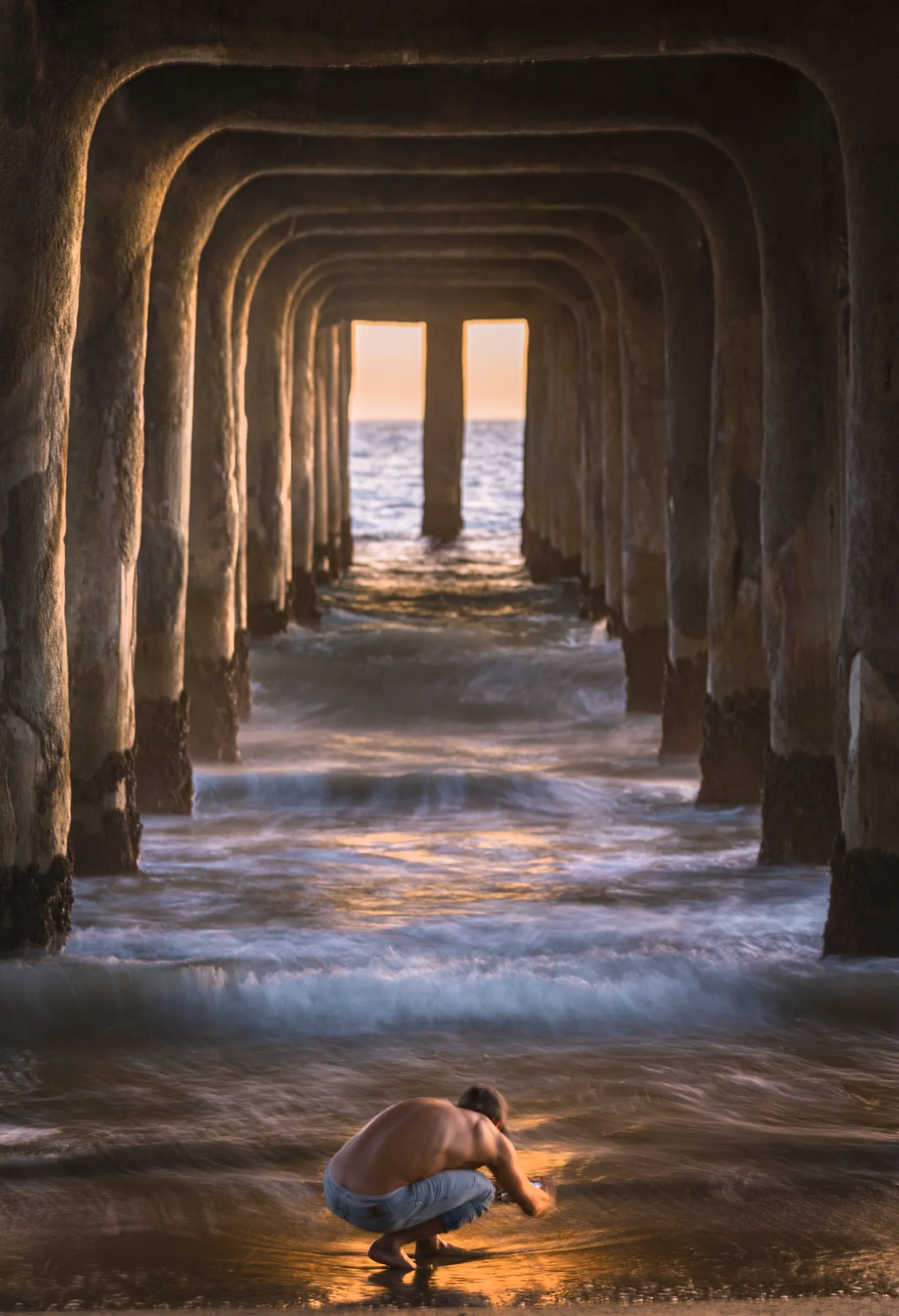 Under the Pier, photograph by Yaniv Bekerman